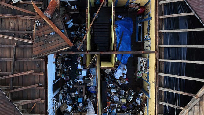 This aerial view shows damages following the passage of a tornado in the city of Puerto Varas, Region de los Lagos, southern Chile, on May 26, 2025.