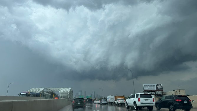 Storm clouds loom implicit    Minnesota drivers connected  Thursday.
