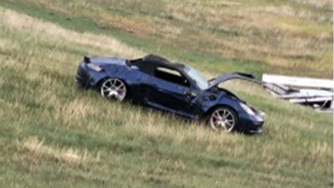 This image shows a damaged vehicle after a tornado in Grinnell, Kansas.