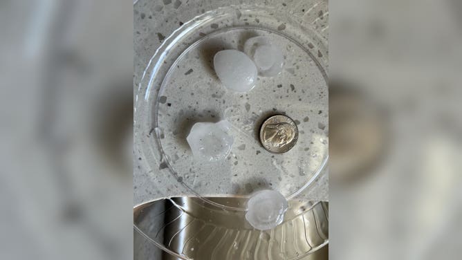 Quarter-sized hail near downtown Asheville, North Carolina on 5/8/2025