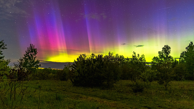 A Michigan photographer captured these views of the Northern Lights over Hancock, Michigan early Thursday, May 29, 2025 during a strong geomagnetic storm.