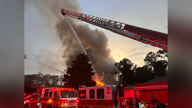 A home in Sanford, Florida, caught fire on May 27 after it was struck by lightning when powerful thunderstorms moved across the area.