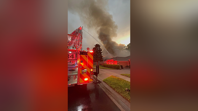 A home in Sanford, Florida, caught fire on May 27 after it was struck by lightning when powerful thunderstorms moved across the area.