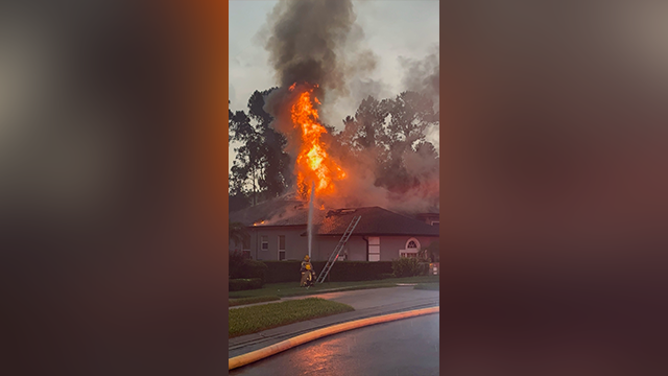A home in Sanford, Florida, caught fire on May 27 after it was struck by lightning when powerful thunderstorms moved across the area.