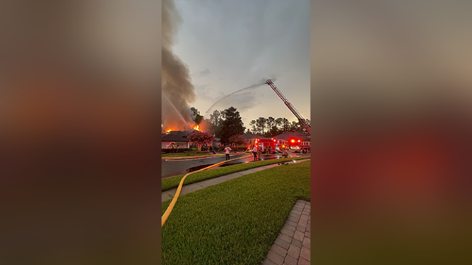 A home in Sanford, Florida, caught fire on May 27 after it was struck by lightning when powerful thunderstorms moved across the area.