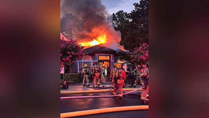 A home in Sanford, Florida, caught fire on May 27 after it was struck by lightning when powerful thunderstorms moved across the area.