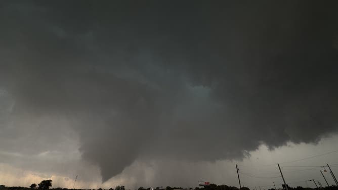 Tornado-warned storm looms over Briggs, Texas. Thursday afternoon, May 1, 2025.