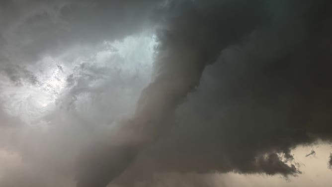 Tornado-warned storm looms over Briggs, Texas. Thursday afternoon, May 1, 2025.
