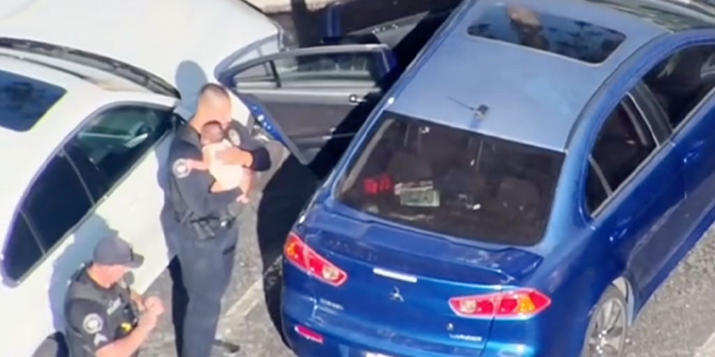 Watch: Heroic California police officers save baby from inside locked, scorching car in Corona