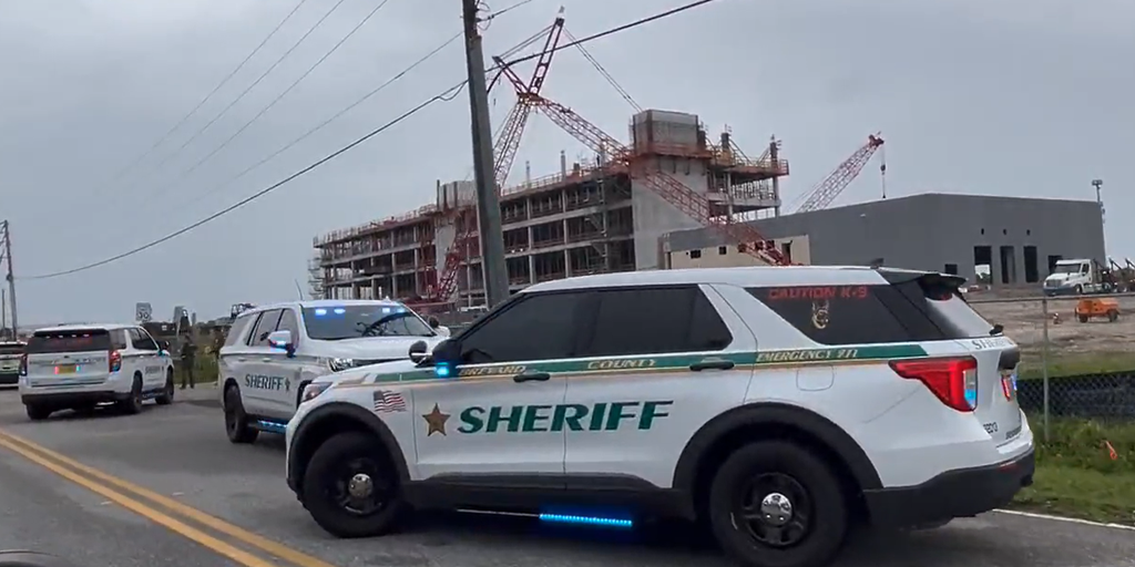 2 workers killed in crane collapse along Florida's Space Coast as state begins to dry out from downpours