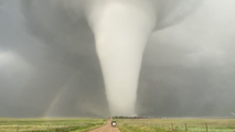 See it: Massive tornado in Nebraska rolls through farmland for an hour as rainbow forms beside it