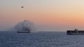 22 rescued after ship carrying thousands of cars caught fire off Alaska