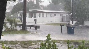 Florida battered by tropical downpours as flash flood threat continues