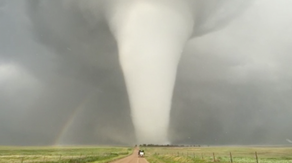 See it: Massive tornado in Nebraska rolls through farmland for an hour as rainbow forms beside it