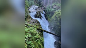Rapid snowmelt slows effort to find 18-year-old who fell over 50-foot Washington waterfall at national park