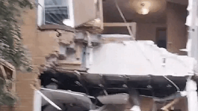 An apartment building in Fairmont, West Virginia, partially collapsed following heavy rainfall and flash flooding as a state of emergency was declared for Marion County.