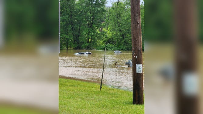 Cars submurged in floodwaters in Murrysville, PA.