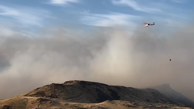 Aircraft flies over the Rowena Fire.