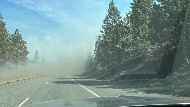 Smoke from the Rowena Fire hangs over the road.