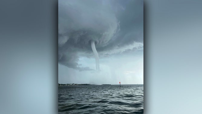 Two colossal waterspouts descended from the storm-laden skies over Manatee River in Bradenton on Sunday, dancing perilously close to one surprised vessel.