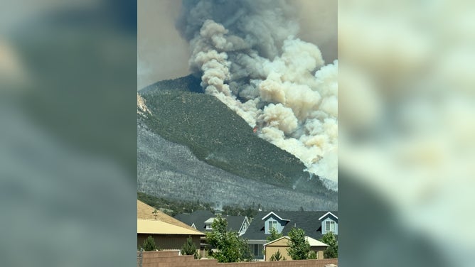 Photo from Monday, June 23, shows Forsyth Fire burning on a mountain in Utah.