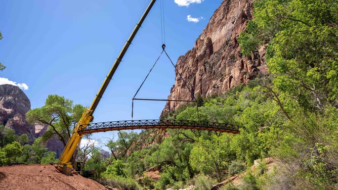 Construction crews moving the emerald pools bridge upstream