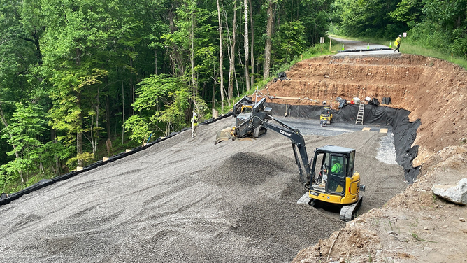 Crews rebuild a mountainside near Ferrin Knob Tunnel No. 3 on the Blue Ridge Parkway in North Carolina. 