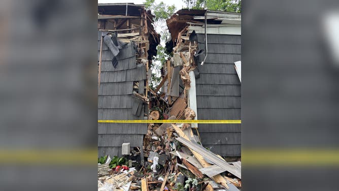 An EF-1 tornado sent tree limbs crashing into homes leaving three dead,