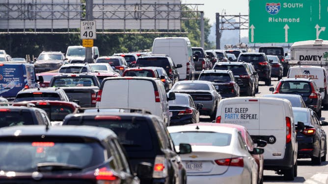 FILE- WASHINGTON, DC - JUNE 30: Motorists drive in traffic on Interstate 395, the Southwest Freeway, on June 30, 2022 in Washington, DC. The Fourth of July holiday weekend is expected to see an increase in traffic with an estimated 42 million people expected to take a road trip on the long weekend, according to AAA. (Photo by Kevin Dietsch/Getty Images)