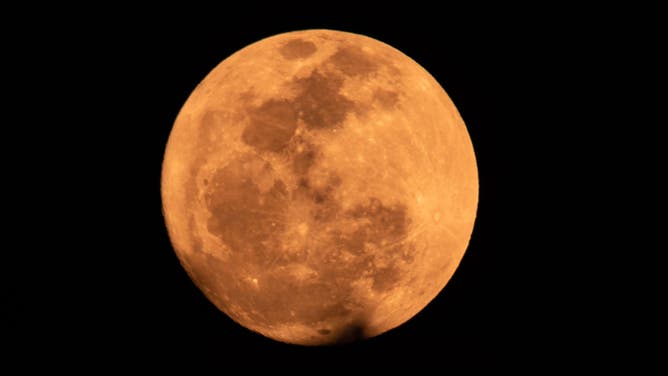 The Strawberry Moon is being seen in Ungaran, Central Java Province, Indonesia, on June 21, 2024.