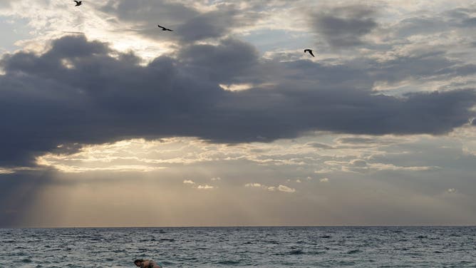 Storm clouds sit offshore at Fort Lauderdale Beach on Aug. 16, 2024, in Fort Lauderdale, Florida.
