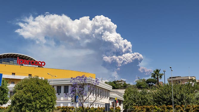 A cloud of ash and gas rise about ten kilometers above the summit craters, as Volcano Etna erupts again starting from the Southeast crater, which generated a pyroclastic flow in the direction of the Bove Valley in Nicolosi near Catania, Italy on June 02, 2025