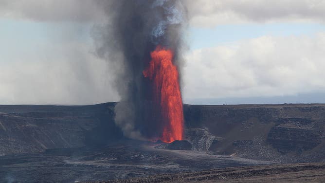HAWAII, UNITED STATES - JUNE 12: Lava fountains rise over 500 feet above the western rim of Halemaumau crater during the ongoing 25th eruptive episode of the Klauea summit eruption in Hawaii, United States, on June 11, 2025. 