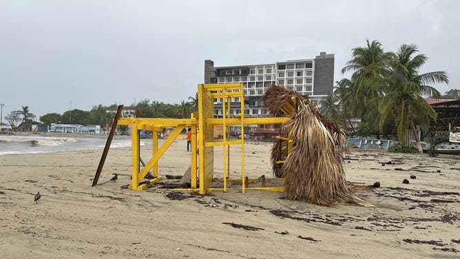 View of a lifeguard station toppled following the passage of Hurricane Erick in Bahia Principal, Puerto Escondido, state of Oaxaca, Mexico, on June 19, 2025. Erick, a category 4 hurricane on a scale of 5, made landfall in the Mexican state of Oaxaca (west) on the Pacific coast, the United States National Hurricane Center (NHC) reported. (Photo by CARLO ECHEGOYEN / AFP) (Photo by CARLO ECHEGOYEN/AFP via Getty Images)
