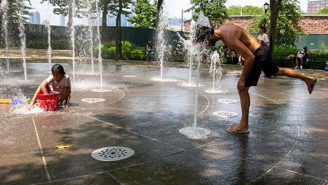 People try to stay cool in Manhattan on June 23, 2025, in New York City.
