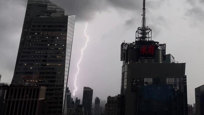 Lightning strikes New York City during Thursday's severe thunderstorms.