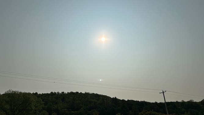 Hazy, smoke-filled skies observed in Berkshire, New York, on Tuesday morning.