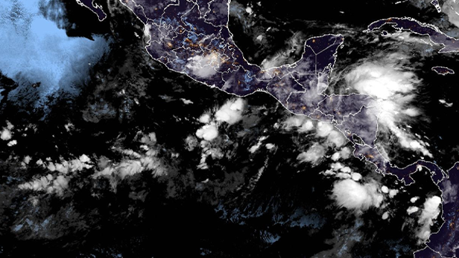 This satellite image shows Invest 95E spinning in the Eastern Pacific off the southern coast of Mexico on June 26, 2025.
