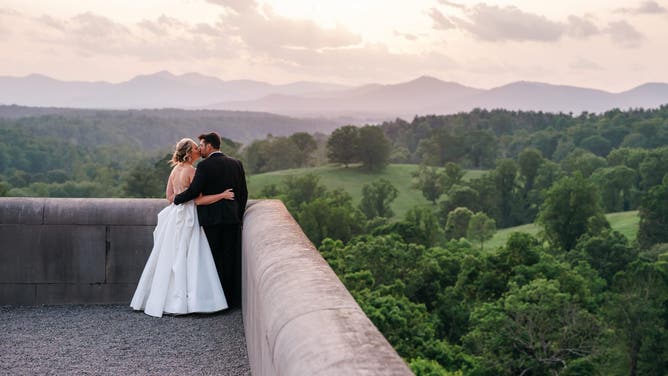 Jansen and Travis with the Blue Ridge Mountains in the background.