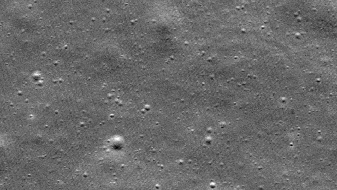 Before-and-after images from the LRO camera showing the area where RESILIENCE impacted the Moon.