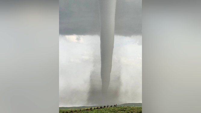 This image shows a massive tornado spinning near Dickens, Nebraska, on Monday, June 16, 2025.