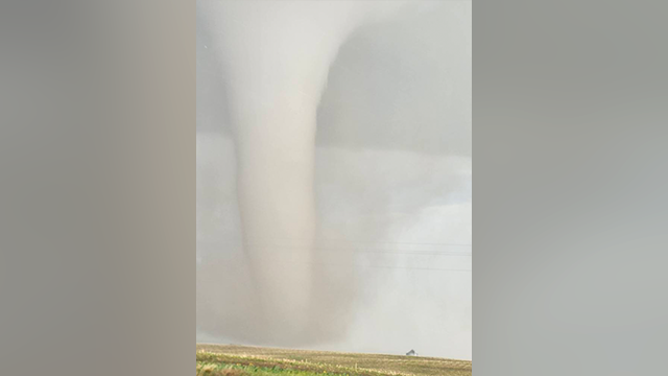This image shows a massive tornado spinning near Dickens, Nebraska, on Monday, June 16, 2025.