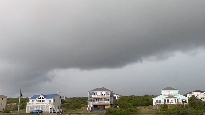 This image shows dark clouds as thunderstorms approached Corolla, North Carolina, on Sunday, June 8, 2025.
