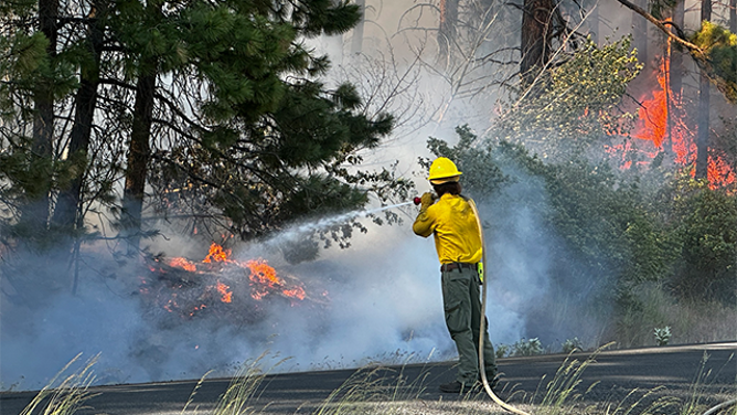 This image shared by Kittitas County Fire District 7 Fire Commissioner Jeff Myers shows crews working to try and contain and extinguish the Red Bridge Fire on June 9, 2025.