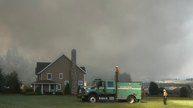 This image shared by Kittitas County Fire District 7 Fire Commissioner Jeff Myers shows crews working to try and contain and extinguish the Red Bridge Fire on June 9, 2025.
