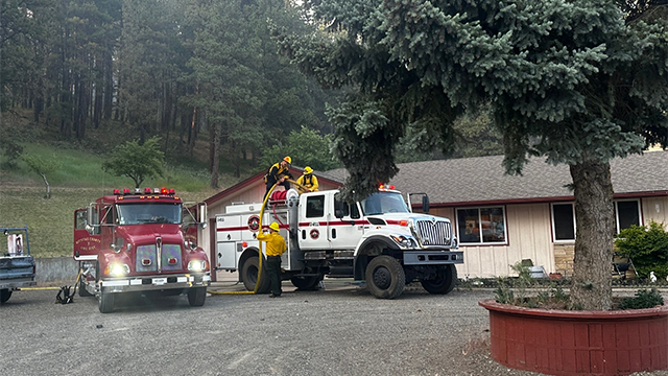 This image shared by Kittitas County Fire District 7 Fire Commissioner Jeff Myers shows crews working to try and contain and extinguish the Red Bridge Fire on June 9, 2025.