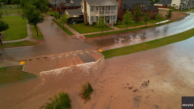 Drone video captures the flooding of streets in Lubbock, Texas, on Thursday.