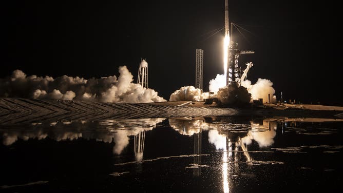 A SpaceX Falcon 9 rocket launches the Dragon spacecraft "Grace" and the Ax-4 crew into orbit on June 25, 2025 from Kennedy Space Center in Florida.