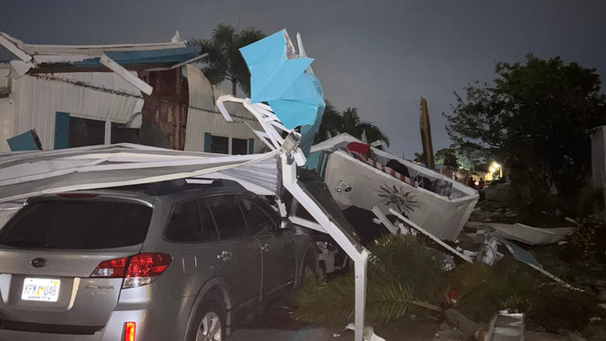 An unexpected tornado tore through parts of Pinellas County on Wednesday, damaging dozens of homes and leaving a trail of destruction in neighborhoods west of Tampa.