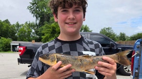 Young angler's nearly 2-pound, record-setting catch shocks Arkansas fishing scene